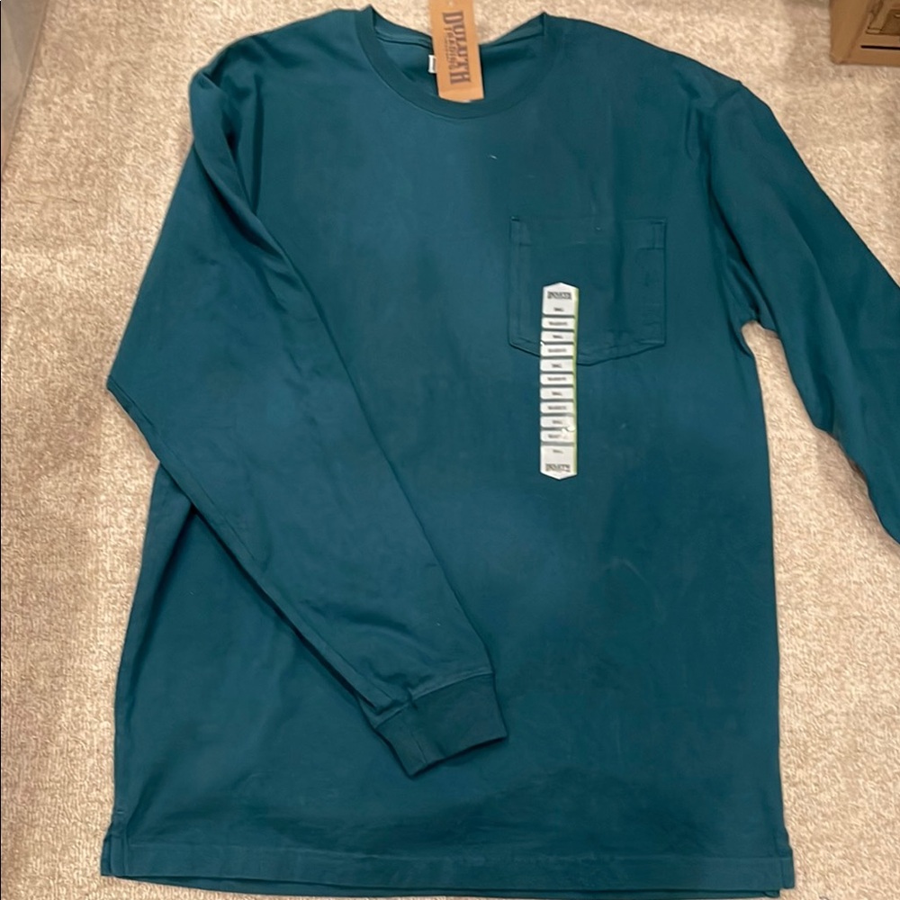 Men’s size small long sleeve Duluth Trading t-shirt.  New with tags.